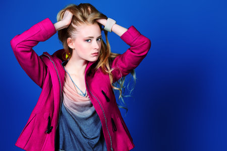 Beautiful fashion model posing at studio. の写真素材