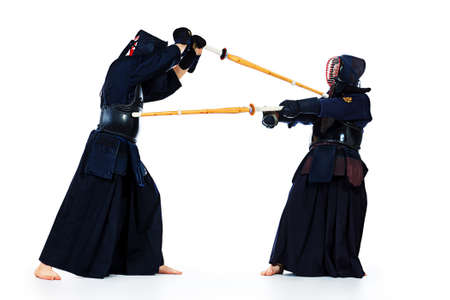 Two kendo fighters are fighting with each other. Asian martial arts.の写真素材