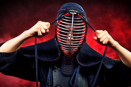 Close-up portrait of kendo fighter. Asian martial arts.