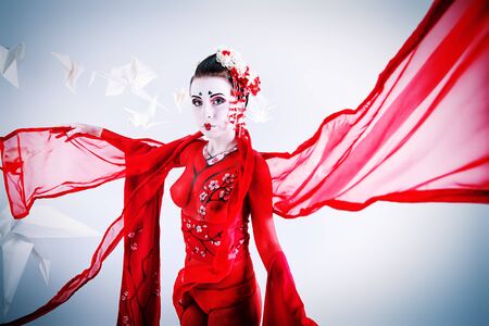 Art portrait of a stylized Japanese geisha. Body painting project. の写真素材