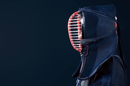 Close-up portrait of kendo fighter. Asian martial arts.の写真素材