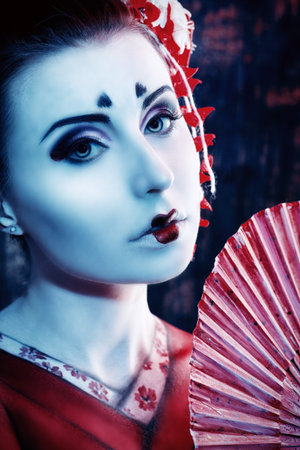 Art portrait of a stylized Japanese geisha. Body painting project. の写真素材