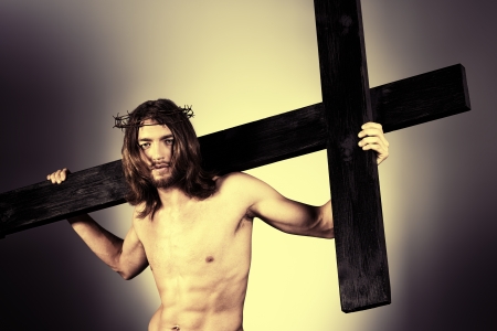 Jesus Christ of Nazareth carrying the cross.の写真素材