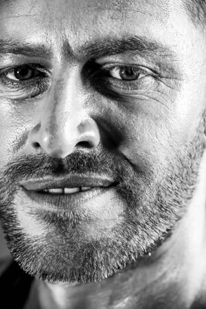 Close-up portrait of a handsome mature man.の写真素材