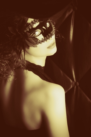 Beautiful elegant woman in carnival mask の写真素材