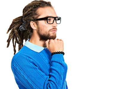 Portrait of a modern handsome young man in spectacles. Isolated over white.