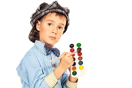 Little boy playing a painter. Different occupations. Isolated over white.の写真素材