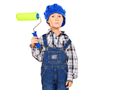 Little boy playing a painter. Different occupations. Isolated over white.の写真素材