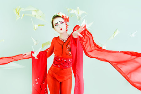 Art portrait of a stylized Japanese geisha. Body painting project. の写真素材