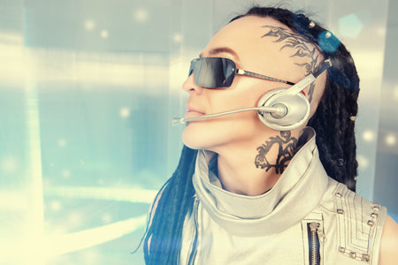 Eccentric futuristic man in silver costume and headset. Innovations and high technology. Rock...