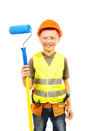 Boy with helmet and tools. isolated on white.の写真素材