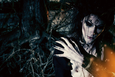 Close-up portrait of a fantasy man in a wild wood