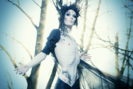 Man-tree in a wild wood. Art project. Fantasy. Halloween.の写真素材