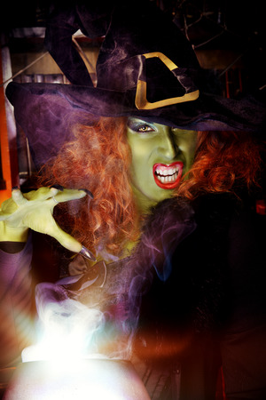 Fairy wicked witch in the wizarding lair. Magic. Halloween.の写真素材