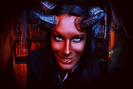 Horned Devil smiling at camera. Fantasy. Ancient style. Halloween.の写真素材