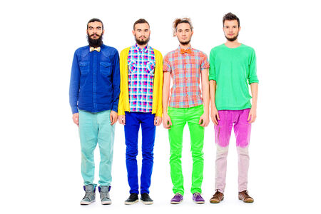 Group of modern bearded young men standing in a row. Full length portrait. Isolated over white.の写真素材