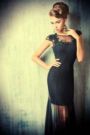 Stunning female model in black evening dress. Fashion shot.の写真素材