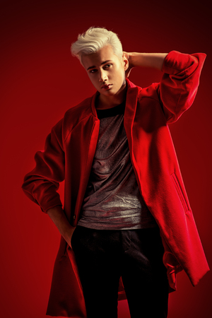 Portrait of a fashionable male model with blond hair. Men's beauty, fashion.の写真素材