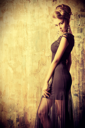 Stunning female model in black evening dress. Fashion shot.の写真素材