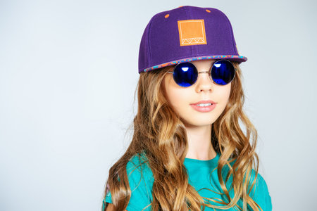 Portrait of a trendy teen girl. Fashion, lifestyle. Studio shot.の写真素材
