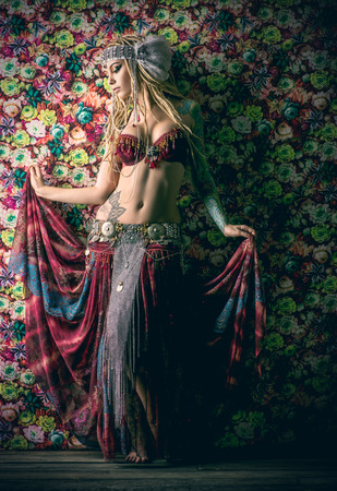 Beautiful traditional female dancer. Ethnic dance. Belly dancing. Tribal dancing.の写真素材