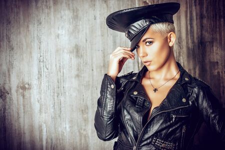 Attractive young woman alluring in a costume of police officer.の写真素材