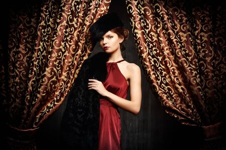 Beautiful young woman posing in fur. Luxury. Vintage style. Beauty, fashion.の写真素材