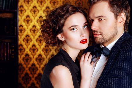 Close-up portrait of a beautiful man and woman in love. Fashion. Love concept.の写真素材