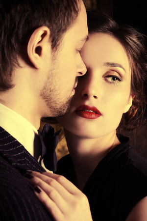 Close-up portrait of a beautiful man and woman in love. Fashion. Love concept.の写真素材