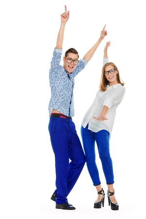 Joyful young people dancing on a party. Isolated over white.の写真素材