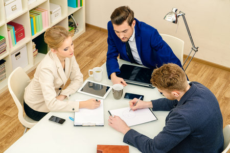 Business partners lead the discussion at the meeting.