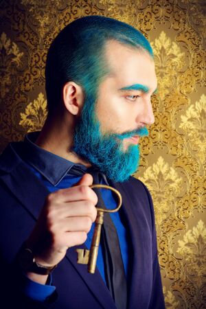 Vintage portrait of a handsome man with blue beard.の写真素材