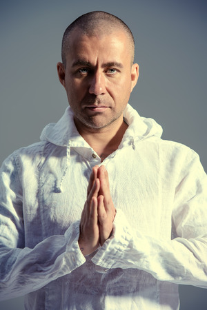 Portrait of the experienced yoga master. Studio shot.の写真素材