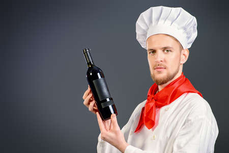 Male sommelier tasting red wine. Winemaking. Occupations.の写真素材