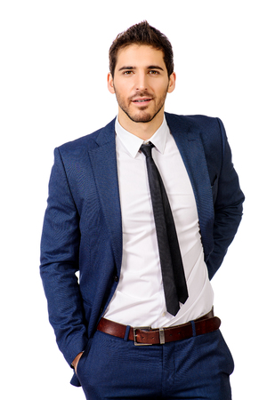 Fashion shot of a handsome man wearing elegant suit. Men's beauty, fashion. Isolated over white.の写真素材