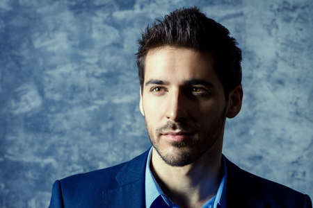 Portrait of a handsome man wearing elegant suit.の写真素材