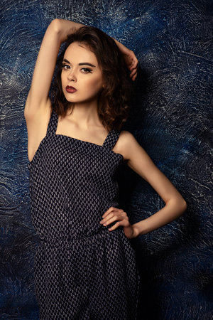 Beautiful fashion model posing in a casual summer suit.の写真素材