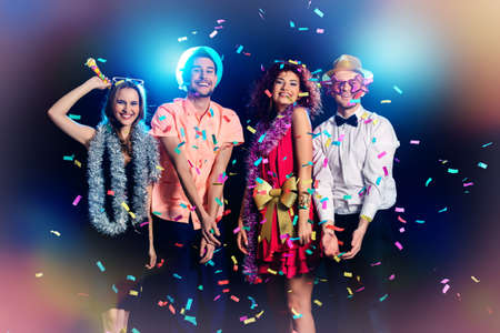 Group of cheerful friends having fun on a party. Holidays, celebration.の写真素材