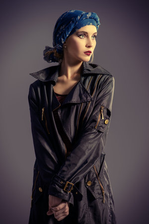 Studio fashion shot. Portrait of a fashionable young woman. Accessories, make-up, cosmetics.
