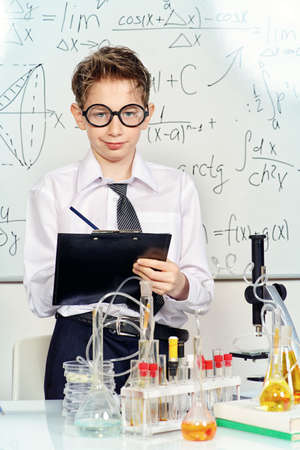 Smart boy making researches in the laboratory. Education.の写真素材