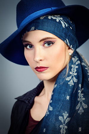 Studio fashion shot. Portrait of a fashionable young woman. Accessories, make-up, cosmetics.の写真素材