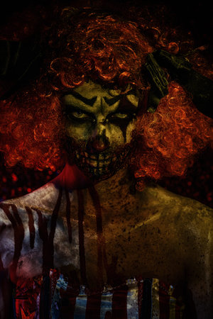 Portrait of a terrible bloody redhead clown. Halloween. Horror.