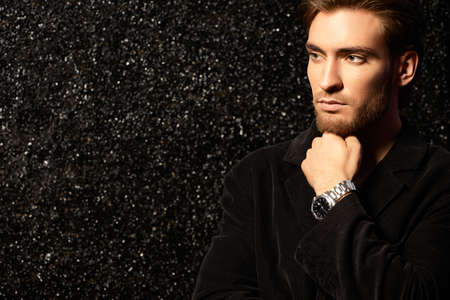 Portrait of a handsome young man. Men's beauty, fashion. Hairstyle.の写真素材