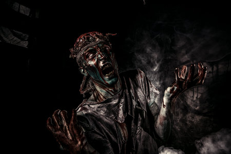 Bloody zombie man with brains out. Horror. Halloween.