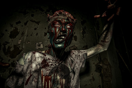 Bloody zombie man with brains out. Horror. Halloween.