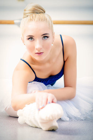 Professional ballet dancer training in a ballet class.の写真素材