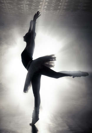 Art concept. Silhouette of a dancing ballerina.の写真素材