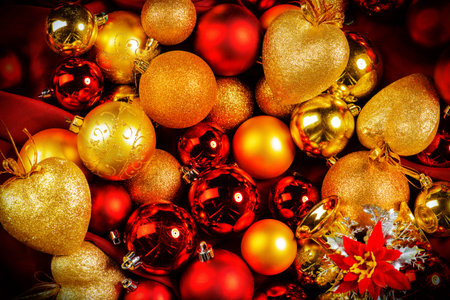 Close-up Christmas background with a lot of Christmas red and golden balls.