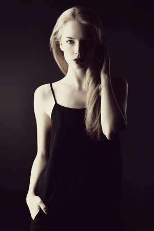 Portrait of a gorgeous blonde woman with sensual maroon lips. Beauty, fashion. Make-up, cosmetics.の写真素材