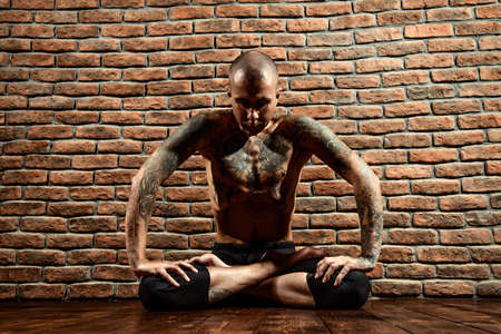 Lotus pose. Yoga master practicing yoga. Meditation, concentration.の写真素材